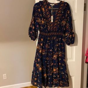 Beautiful navy blue flowered dress. Flowy with 3/4 length sleeves, size M, new